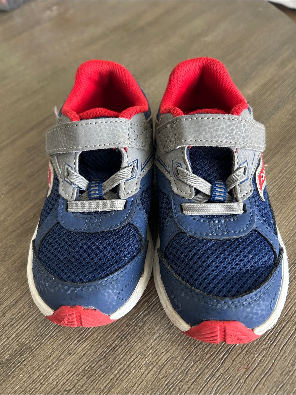 SAUCONY
cohesion 14 a/c sneaker Athletics ,Kids Navy, Red, Gray.